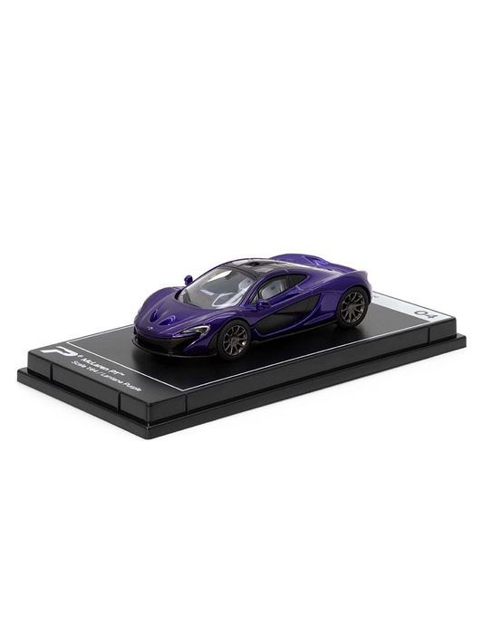 A diecast scale model on a showcase tray