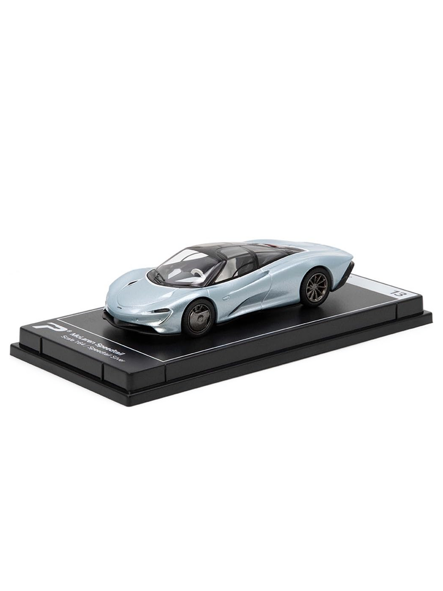 A diecast scale model on a showcase tray
