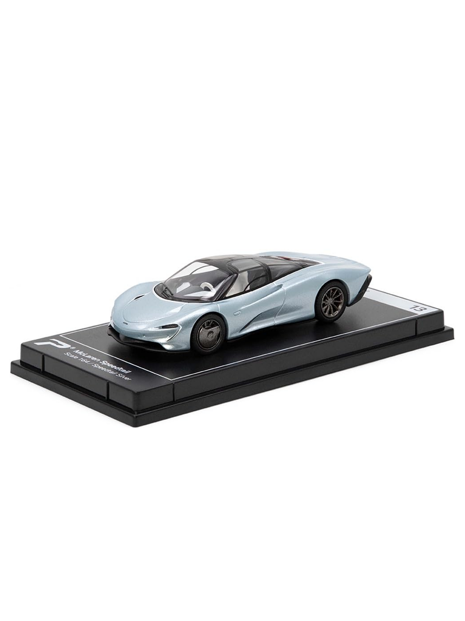 A diecast scale model on a showcase tray