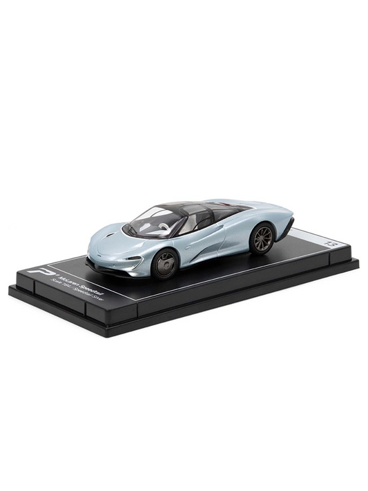 A diecast scale model on a showcase tray